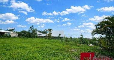 terrain plat 405 m2- zone uc bras de pontho