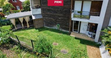 appartement t3 en rez-de-chaussée avec grand jardin privatif dans résidence calme à bras-panon