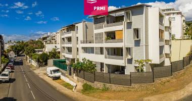 saint-denis/montgaillard : t2 lumineux avec varangue et parking - résidence récente