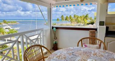 la marina vue imprenable sur lagon : t2 duplex meuble 54 m2 piscine debarras